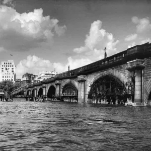Preparations are made to shore up the arches of Waterloo Bridge prior to the commencement