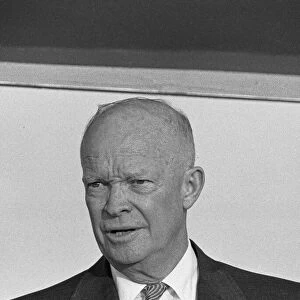 US President Eisenhower seen here on the dais at Heathrow Airport as he is officially