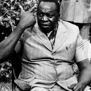President of Uganda, General Idi Amin, speaking at a conference. Circa July 1975 President of Uganda, General Idi Amin, speaking at a conference. Circa July 1975