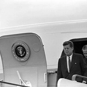 President of the United States of America John F. Kennedy descends from Air Force One