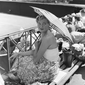 A pretty spectator at Wimbledon Tennis Championships, July 1957