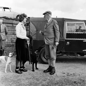 Prime Minister Harold Macmillan with Her Grace the Duchess of Devonshire