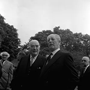 Prime Minister Harold MacMillan MP and Mr Diefenbaker of Canada talking at a meeting of