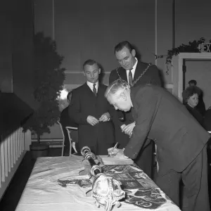 Prime Minister Harold Wilson (1916 - 1995) signing the visitors book at the Jarrow Civic Prime Minister Harold Wilson (1916 - 1995) signing the visitors book at the Jarrow Civic