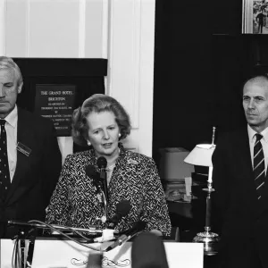 Prime Minister Margaret Thatcher and Conservative Chairman Norman Tebbit return to Prime Minister Margaret Thatcher and Conservative Chairman Norman Tebbit return to