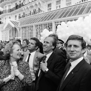 Prime Minister Margaret Thatcher and Conservative Chairman Norman Tebbit return to Prime Minister Margaret Thatcher and Conservative Chairman Norman Tebbit return to