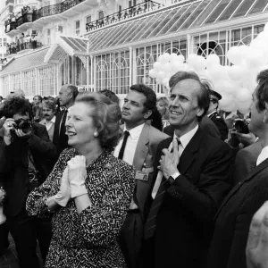 Prime Minister Margaret Thatcher and Conservative Chairman Norman Tebbit return to Prime Minister Margaret Thatcher and Conservative Chairman Norman Tebbit return to