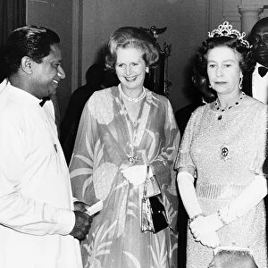 Prime Minister Margaret Thatcher meets the Queen at party given by Her Majesty for
