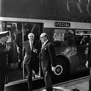 Prime Minister Mr. Wilson leaves bus which took him on a Tour of Manchester