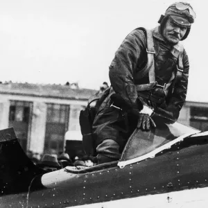 Prime Minister Ramsay MacDonald seen here climbing aboard a Fairey 3F aircraft of number