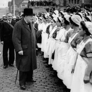 Prime Minister Winston Churchill accompanied by the Mayor and Alderman JA Mosely Prime Minister Winston Churchill accompanied by the Mayor and Alderman JA Mosely