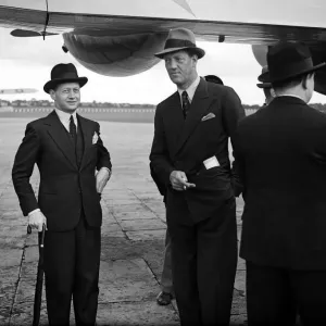 Prince Axel of Denmark (centre) on a official visit dis-embarks from Danish Air Lines