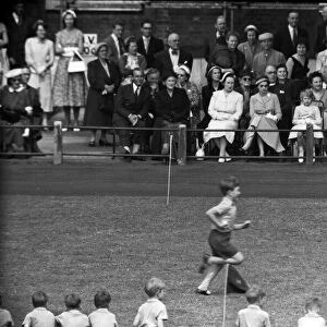 Prince Charles aged 9 at school sports day running, watched by Queen Elizabeth