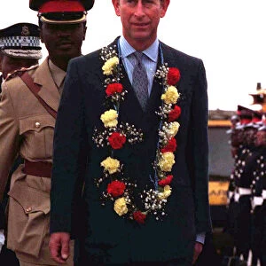 Prince Charles arrives in Swaziland in Africa on an official visit, October 1997