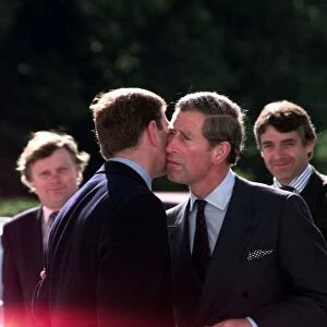 Prince Charles and the Duke Of York embrace June 1998 The two Princes kiss at
