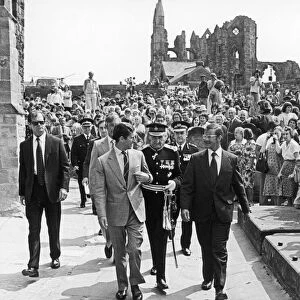 Prince Charles is greeted by large crowds on his arrival at Whitby Abbey during