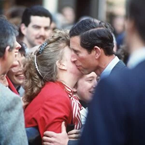 Prince Charles kissing girl on walkabout at the Glasgow Garden Festival 1988