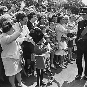 Prince Charles, The Prince of Wales is cheered by crowds. September 1969