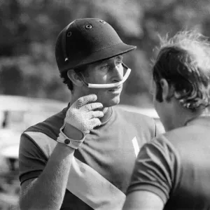 Prince Charles, the Prince of Wales pictured with a teammate after taking part in a polo Prince Charles, the Prince of Wales pictured with a teammate after taking part in a polo