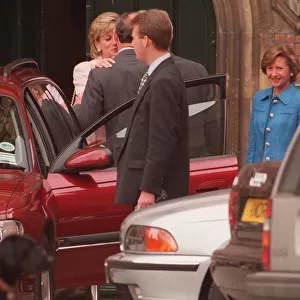 Prince Charles and Princess Diana kissing after being at Eton College for Eton Open Day