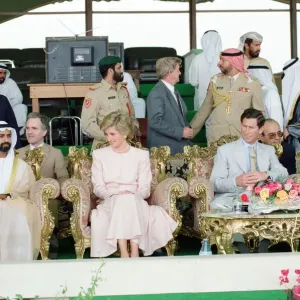 Prince Charles and Princess Diana visit a camel race at Al Maqam