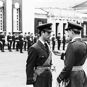 Prince Charles receiving his pilots wings from Air Chief Marshal Sir Denis Spotswood at