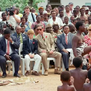 Prince Charles and Prince Harry Watch Dancers in South Africa Print Prince Charles and Prince Harry Watch Dancers in South Africa Print