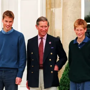 Prince Charles with his two sons Prince William (left) and Prince Harry at Buckingham