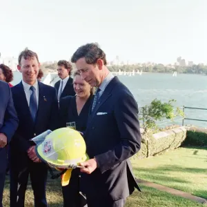 Prince Charles in Sydney, pictured holding a fire fighters helmet. Sydney, Australia