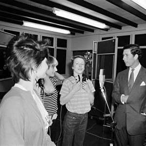 Prince Charles visits Londons Capital Radio. Pictured meeting the Mo-dettes