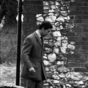 Prince Charles walks a dog at the Sandringham Shooting January 1981