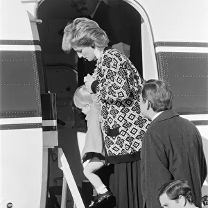 Prince Harry and his mother Princess Diana, arrive at Heathrow Airport, London