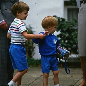 Prince Harry September 1987 wearing a blue sweatshirt shorts
