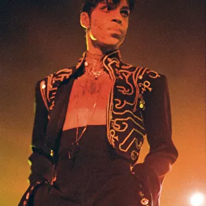 Prince performing on stage during his Ultimate Live Experience Tour