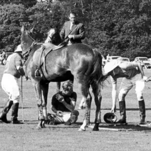 Prince Philip crouches beneath his Horse Lightening after he colided with three others Prince Philip crouches beneath his Horse Lightening after he colided with three others