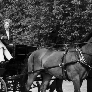 Prince Philip driving carriage with Nancy Reagan beside him - June 1982