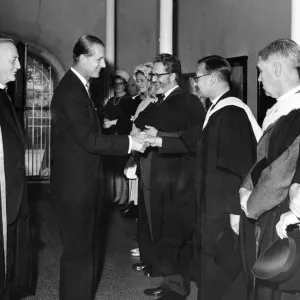 Prince Philip, Duke of Edinburgh, chatting to senior tutor Rev