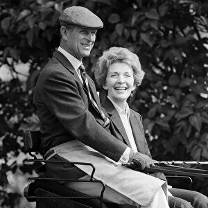 Prince Philip the Duke of Edinburgh with First Lady Nancy Reagan in his carriage during