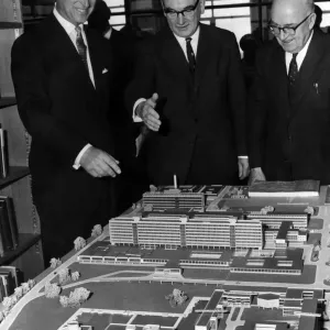 Prince Philip, the Duke of Edinburgh, looking at a model of the completed scheme