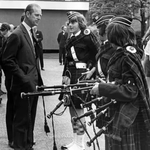 Prince Philip, Duke of Edinburgh, North West visits. The Duke chats to three pipers of