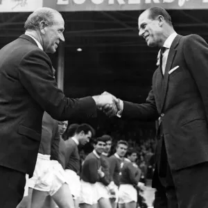 Print of Prince Philip shaking hands with Matt Busby at Maine Road