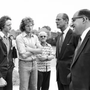 Prince Philip, Duke of Edinburgh stops to have a joke with Castle Irwell gardeners with a