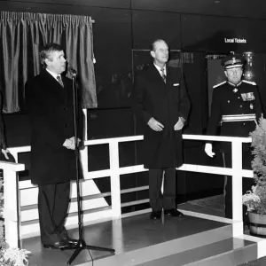 Prince Philip, Duke of Edinburgh, unveils a plaque at the new Travel Centre in