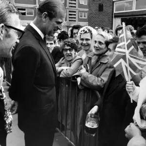Prince Philip, Duke of Edinburgh visits Salford. Labourer David Stone, holding his pint Prince Philip, Duke of Edinburgh visits Salford. Labourer David Stone, holding his pint
