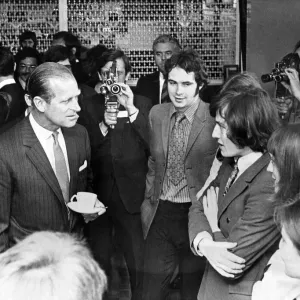 Prince Philip visiting Wales. The Duke of Edinburgh chatting to students in Prince Philip visiting Wales. The Duke of Edinburgh chatting to students in