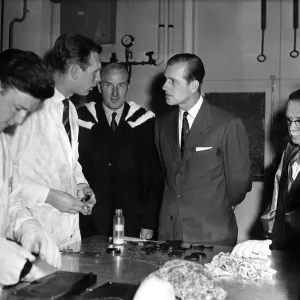 Prince Philip visiting Wales. The Duke talks to students in the chemistry department