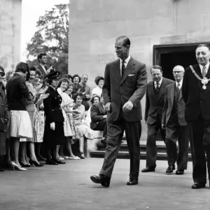 Prince Philip visiting Wales. A smiling Duke of Edinburgh leaves the college after