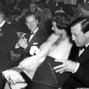 Prince Phillip at the cinema with left to right, Earl Mountbatten, Prince Phillip