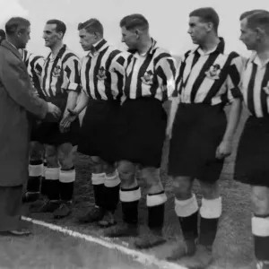 The Prince of Wales shaking hands with Newcastle United team The Prince of Wales shaking hands with Newcastle United team