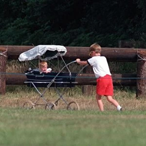 Prince William Collection 1989 Prince William pushing Princess Beatrice in pram